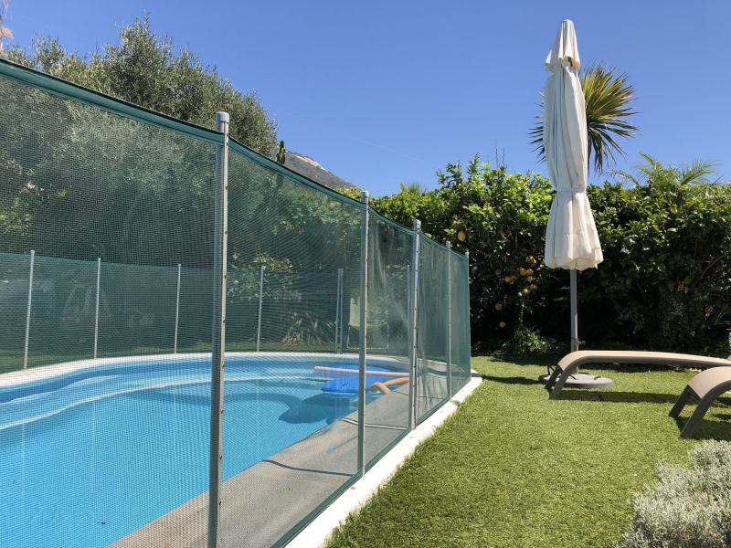 Pool Area with Mesh Fence